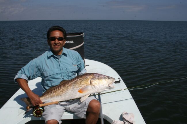 Boni Galan’s first Redfish on Fly! 27lbs.
