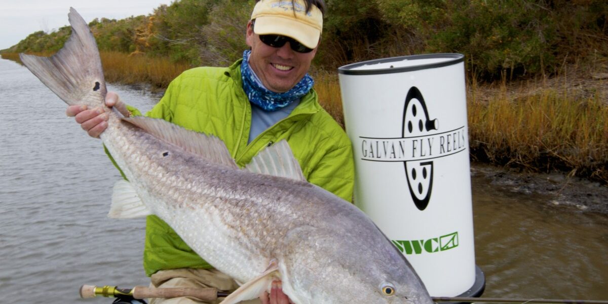 Kelly’s Giant 30 pound Redfish caught in 30 knot’s of breeze